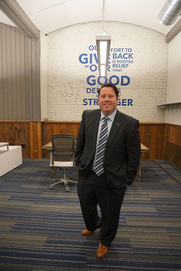 Tom Nardacci stands in the offices of Gramercy Communications agency in Albany NY